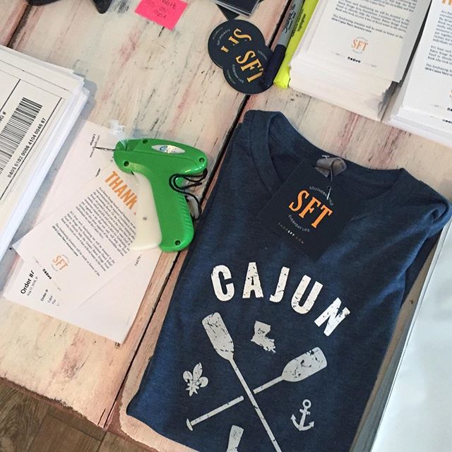 SFT Cajun Navy T-shirt Raises $40k for Greater Baton Rouge Food Bank | Shop It in Purple & Gold, Black & Gold and Blue
